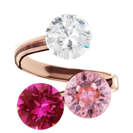 Rosegold gredzens ar gaiši rozā, caurspīdīgu un fuksijas kristālu