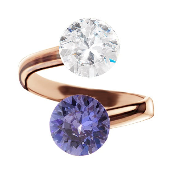 Rosegold gredzens ar parastu un tanzanite kristālu
