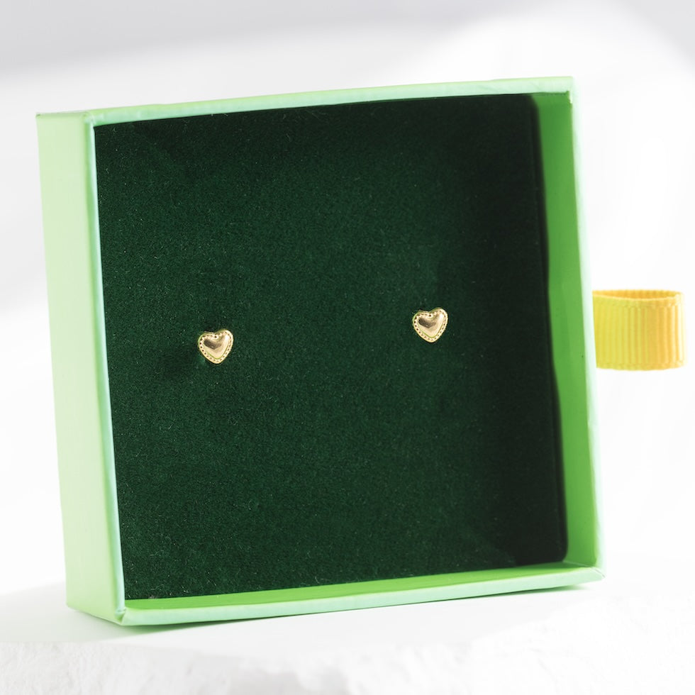 Children's stud earrings 'ZEMENE' with screw-on flat backs.