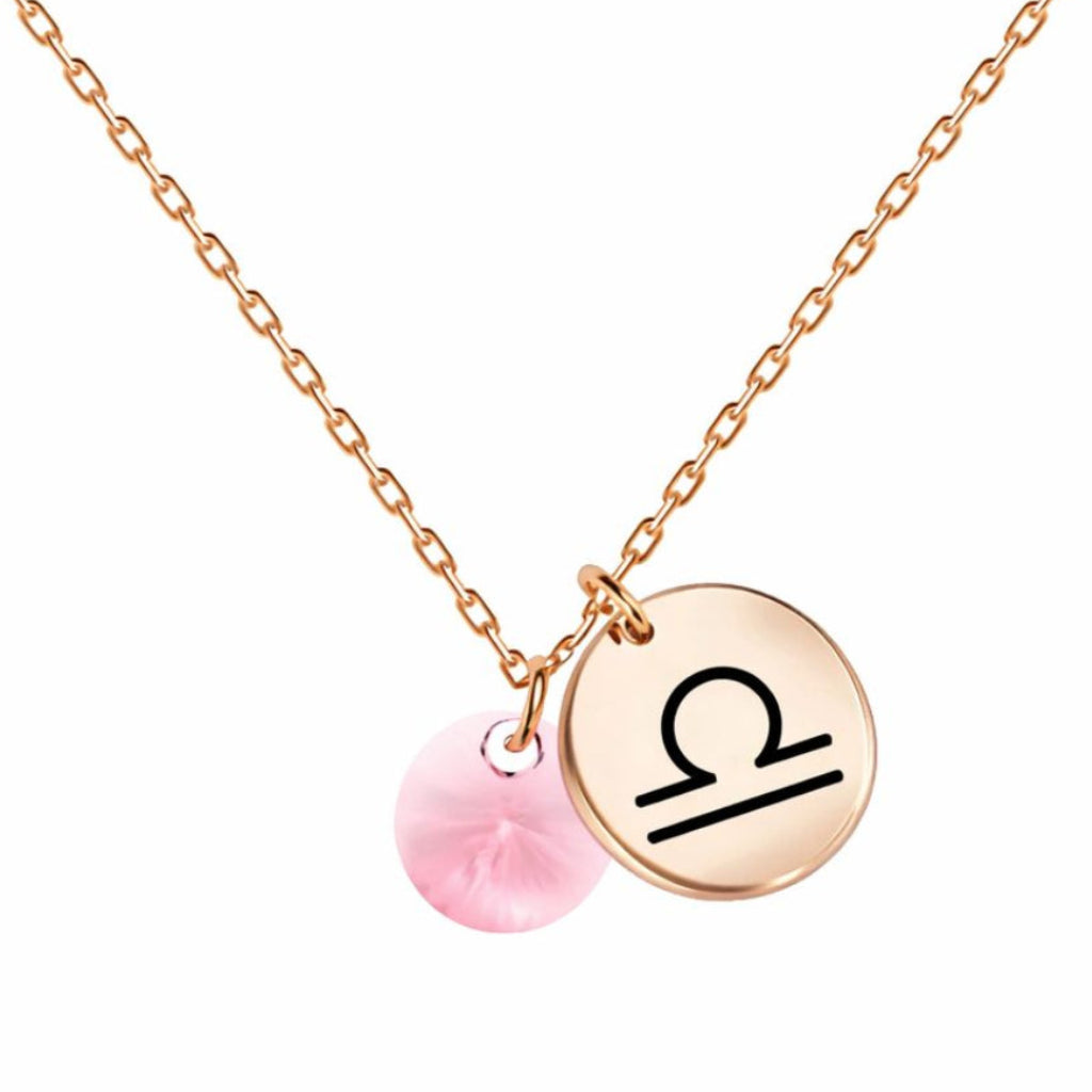 Kaklarota ar zodiaku un gaiši rozā kristālu