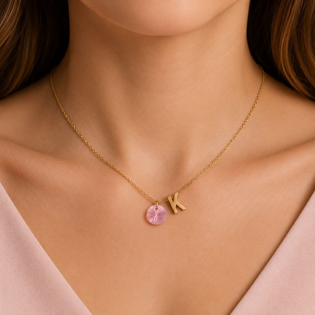 Necklace with a hanging letter and crystal